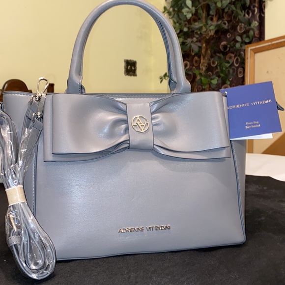 Purse with bow design on front. Brand new with tag. Gray purse. - Picture 4 of 16